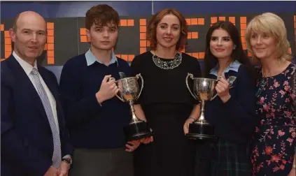 ??  ?? Principal Shane Eivers, year head Margaret McCormack and deputy principal Carol Buckley with the Sixth Year Students of the Year, Marc Brady and Kate Toner.
