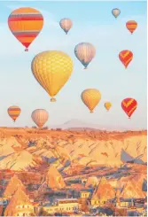  ?? ?? Hot air balloons fly over Cappadocia, Turkey