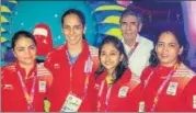  ?? PTI ?? ▪ Saina Nehwal (2nd from left) with her father and shooters Apoorvi Chandela, Mehuli Ghosh and Tejaswini Sawant at Games Village.