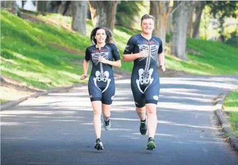  ?? Picture / Doug Sherring ?? Laverne Robilliard and Connor Clemett say the idea of running to help others walk continues to inspire them.