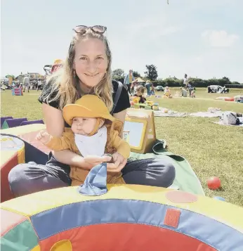  ?? ?? Jenni Wessels from Southsea, with her four-month-old daughter Florence. Picture: Sarah Standing