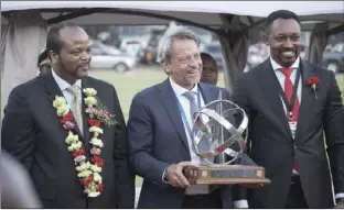  ?? ?? EU ambassador Jobst von Kirchmann receives an award from King Mswati (left) as Busisa Moyo, chairperso­n of the ZITF board looks on. Picture: KB Mpofu