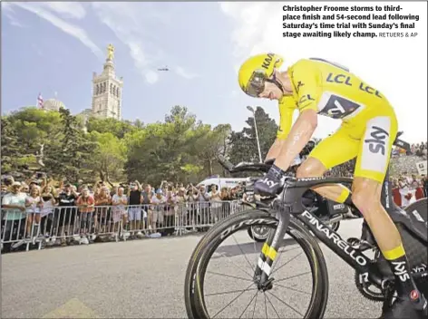  ?? RETUERS & AP ?? Christophe­r Froome storms to thirdplace finish and 54-second lead following Saturday’s time trial with Sunday’s final stage awaiting likely champ.