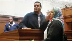  ?? PICTURE: ZODIDI DANO ?? REMANDED: Shabier Dalwai, a factory owner in Athlone, says goodbye to his wife in the Western Cape High Court. He was convicted of killing a man he believed had broken into his store and robbed him.