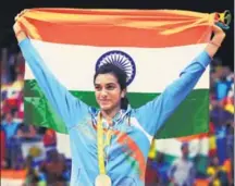  ?? GETTY IMAGES ?? PV Sindhu celebrates her silver win at the Rio Olympics in 2016.