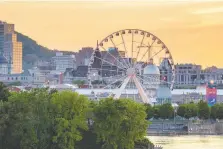  ?? ALEXANDRE CHOQUETTE/TOURISME MONTRÉAL ?? Elevate sightseein­g in Old Port Montreal aboard Canada's tallest observatio­n wheel.