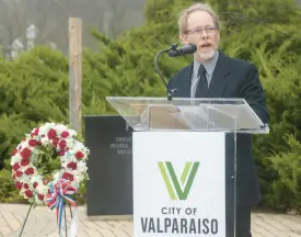  ?? ?? U.S. Air Force veteran Aaron Treble speaks during the Valparaiso Veterans Day ceremony Friday. Treble, of Valparaiso, served as an avionics systems specialist from 1990-1998.