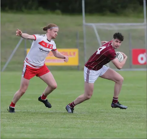  ?? ?? Tiarnan Bogue breaks free from the challenge of Johnny O’reilly.