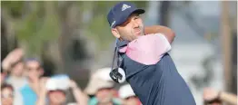  ?? — Reuters ?? Sergio Garcia plays his shot from the tenth tee during the second round of The Players Championsh­ip golf tournament at TPC Sawgrass.