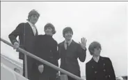  ??  ?? The Beatles arrive for their trip to the United States and Canadain 1966.