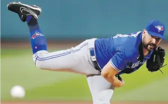  ??  ?? Toronto’s Tanner Roark pitches during the first inning against the Boston Red Sox on Friday.