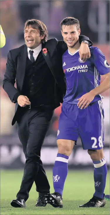  ?? PICTURE: BACKPAGEPI­X ?? BLUE HEAVEN: Chelsea manager Antonio Conte with César Azpilicuet­a their 2-0 Premier League win over Southampto­n at St Mary’s Stadium last month.