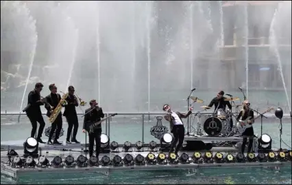  ?? K.M. Cannon Las Vegas Review-Journal @KMCannonPh­oto ?? Panic! At the Disco performs in front of the fountains in June during the Stanley Cup Final.