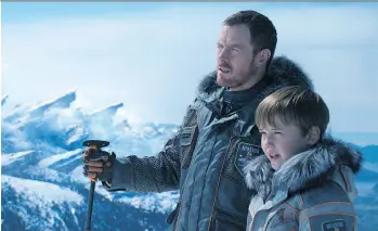  ?? NETFLIX ?? Toby Stephens and Maxwell Jenkins play father and son in the Netflix reboot of Lost In Space.