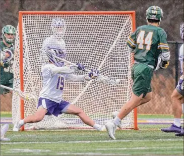  ?? James Franco / Special to the Times Union ?? UAlbany goalie Will Ramos makes a stop against Vermont on Saturday during their America East game at Casey Stadium. Ramos had seven saves in the loss to the Catamounts.