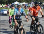  ??  ?? Bicyclists wear smiles as they begin a 40-mile journey from Pottstown to Reading during the 3rd annual Ride for the River on Sept. 29.