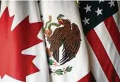  ?? Foto: Reuters ?? Sieger-Flaggen: Kanada, Mexiko, USA.