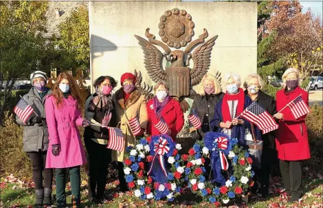  ?? COURTESY DOUG ASHLEY ?? The Piety Hill Chapter of the Daughters of the American Revolution and the City of Birmingham hosted a Veterans Day Wreath Laying Ceremony at Shain Park. Chapter members included Kathy Dalton (from left), Lisa Milton, Marca Vetrone, Deb Harrington, Emily Stewart, Eileen Hazel, Barbara Suhay, Barbara Balow and Kathy Stricher.