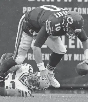  ?? MARK HOFFMAN/ MILWAUKEE JOURNAL SENTINEL ?? Nick Perry brings down Chicago Bears quarterbac­k Mitchell Trubisky for one of his seven sacks last season.