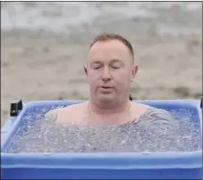  ??  ?? Karl Bracken taking part in the beach ice bath challenge in aid of 3Ts anti suicide charity at Blackrock beach.