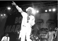  ?? The Associated Press ?? Q In this Feb. 6, 2005, file photo, Bunny Wailer performs at the One Love concert to celebrate Bob Marley’s 60th birthday, in Kingston, Jamaica.