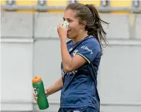  ?? PHOTOSPORT ?? Phoenix player Chloe Knott copped a lucky break when clashing heads with a rival. Knott appears to have escaped with only a minor injury.