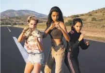  ?? Merie Weismiller Wallace / Sony Pictures ?? Kristen Stewart (left), Ella Balinska and Naomi Scott star in “Charlie’s Angels,” based on the 1970s television series.