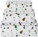  ??  ?? Storage tins offer a fail-safe way of preventing clutter. This set of three Terrazzo tins from Ferm Living, £30, is stylish enoughto keep out on display