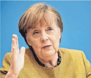  ?? FOTO: MICHAEL KAPPELER/AFP ?? Auch wenn die Corona-Pandemie fordernd sei, wolle sie mit ganzer Kraft „möglichst vernünftig regieren – und zwar bis zum letzten Tag, an dem ich die Verantwort­ung habe“, sagte Kanzlerin Angela Merkel in Berlin.