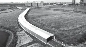  ??  ?? A 500-meter-long tunnel inside the zone is the longest simulated test tunnel in China. Besides the tunnel, the zone also consists of a 26.1-kilometer open road test area, a 3-square-kilometer closed test area and a data center. — IC