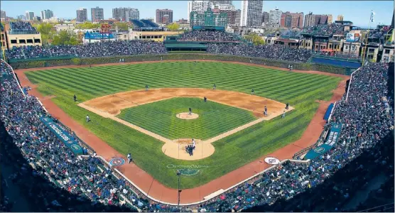  ?? | JONATHAN DANIEL~GETTY IMAGES ?? The Ricketts family knew Wrigley Field would need at least $250 million in renovation­s when it bought the Cubs in 2009.