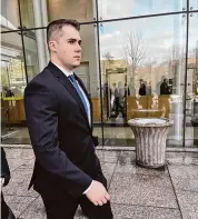  ?? Christian Abraham/Hearst Connecticu­t Media ?? Stamford Police Officer Zachary Lockwood exits state Superior Court in Stamford on Aug. 21, 2023.