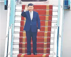  ??  ?? Xi arrives at the Noi Bai internatio­nal airport in Hanoi, Vietnam. — Reuters photo