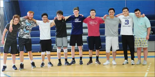  ?? Photo by Ernest A. Brown ?? Burrillvil­le boys volleyball players (from left to right) Jacob Choquette, Shawn Deroy, Lorence Cura, Shea Foisy, Jacob Keens, Joe Choquette, Kian Cura, Alex Carlow and Cam Ducharme form the first Bronco boys volleyball team in school history. The team will play in Division III this season.