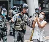  ??  ?? Tensions: Protests have resurfaced in Hong Kong as the US warned the territory no longer warrants special treatment