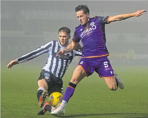  ??  ?? Marc McNulty tries to evade the challenge of St Mirren’s Marcus Fraser.