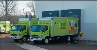  ?? DIGITAL FIRST MEDIA FILE PHOTO ?? Peapod by Giant has expanded its online grocery shopping and delivery in Berks County — making the service available in Exeter and Birdsboro. In this file photo Peapod trucks are ready to be loaded at the North Coventry Giant Food store on Glocker Way....