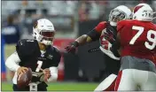  ?? ASSOCIATED PRESS ?? ARIZONA CARDINALS quarterbac­k Kyler Murray (1) runs with the ball as Cardinals offensive tackle Korey Cunningham (79) puts a block on Cardinals defensive tackle Darius Philon, (middle) during an NFL football training camp practice at State Farm Stadium Tuesday in Glendale.