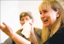  ?? Genaro Molina Los Angeles Times ?? ROBIN CLOUGH tears up in her Santa Clarita home while recounting how difficult her cancer treatment has been. At left is her life partner, Dr. Gene Dorio.