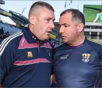  ??  ?? Wexford Senior football manager Seamus McEnaney congratula­tes his counterpar­t, Tom Cribbin, after Westmeath’s runaway victory in Saturday’s Allianz League Division 4 final in Croke Park.