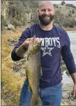  ?? COURTESY PHOTO ?? Aaron Ankeny of Albuquerqu­e caught a 20-inch brown trout below El Vado Lake using a Panther Martin spinner on the Chama River.