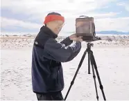 ?? CRISTINA CARREON/ALAMOGORDO DAILY NEWS ?? Photograph­er QT Luong uses a large-format wooden camera to take high-resolution photograph­s of nature.