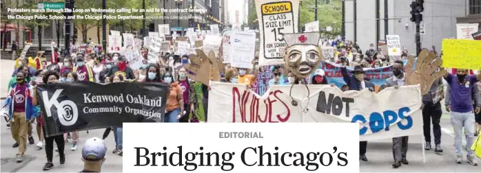  ?? ASHLEE REZIN GARCIA/SUN-TIMES ?? Protesters march through the Loop on Wednesday calling for an end to the contract between the Chicago Public Schools and the Chicago Police Department.