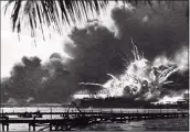  ?? National Archives / TNS ?? The USS Shaw explodes during the Japanese raid on Pearl Harbor, Dec. 7, 1941.