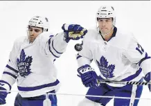  ?? GRANT HALVERSON/GETTY IMAGES ?? Maple Leafs head coach Mike Babcock will look to match up Nazem Kadri, left, shown with Patrick Marleau, against the Flames’ Johnny Gaudreau and Sean Monahan.