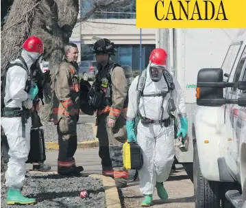  ?? MORGAN MODJESKI / POSTMEDIA NEWS FILES ?? Saskatoon firefighte­rs respond to a suspicious package containing a harmless white powder at the Saskatoon Inn and Suites in April. A Saskatoon woman has been charged with a string of bizarre incidents involving white powder.