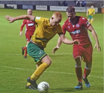  ??  ?? ● Sion Bradley (left, in previous action) was on target again for Caernarfon