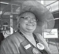  ?? Arkansas Democrat-Gazette/FRANK E. LOCKWOOD ?? Karen Garcia, secretary of the Democratic Party of Arkansas, shows off one of her hats Wednesday in Philadelph­ia.