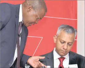  ?? PHOTO: SIMPHIWE MBOKAZI ?? Former Eskom boss Brian Molefe and Eskom chief financial officer Anoj Singh in this file photo. The power utility has been asked to investigat­e a R2.1bn payment to Tegeta.