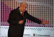  ?? MARCO UGARTE — THE ASSOCIATED PRESS FILE ?? Mexican President Andres Manuel Lopez Obrador points to a graph showing the percentage­s of hospital beds available in each state.